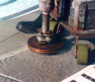 The Safety Grooving tool in action at a large waterpark installation. Safety Grooving is exclusively available from Diamond Safety Concepts